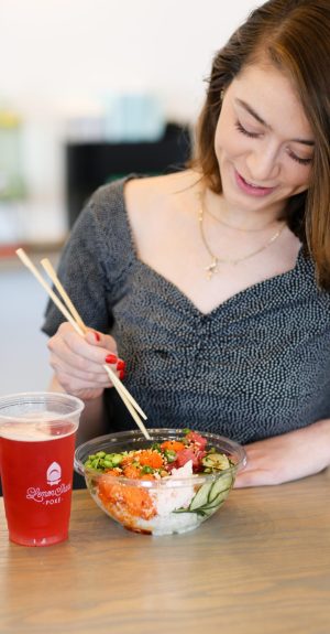 LemonsharkPoke_SpringSocialContent_April192019-119-1-scaled.jpg Customer enjoying Poke bowl